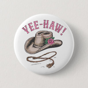 A classic cowboy hat  adorned with a single pink  6 cm round badge