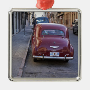 A classic old red Peugeot car parked on a street Metal Tree Decoration