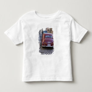 A classic old red Peugeot car parked on a street Toddler T-Shirt