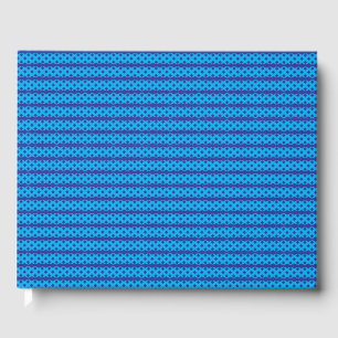 A clear blue sky stretches above a calm, deep blue guest book