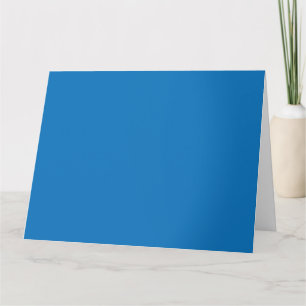 A clear blue sky with no clouds fills the entire f card