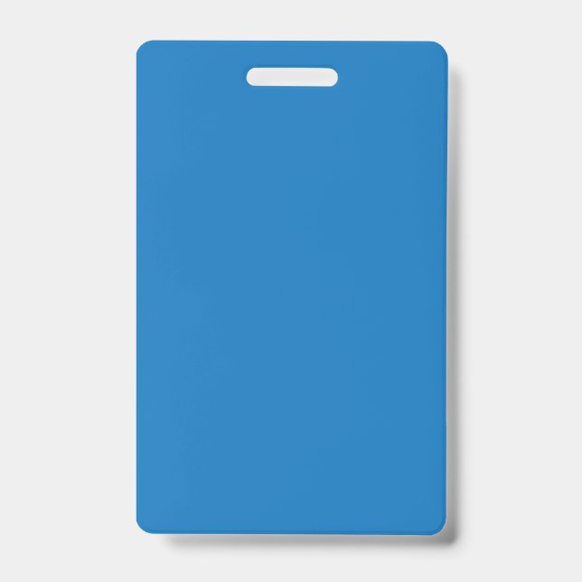 A clear blue sky with no clouds fills the entire f ID badge (Front)