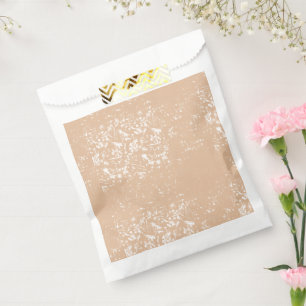 A close-up view of a textured wall featuring patte favour bags