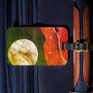 A close up view of fantasy worlds and their moons luggage tag