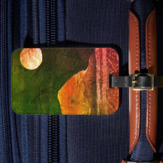 A close up view of fantasy worlds and their moons luggage tag