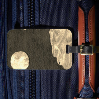 A close up view of fantasy worlds and their moons luggage tag