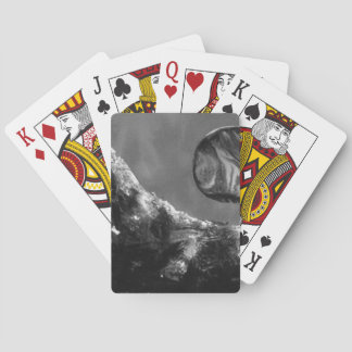A close up view of fantasy worlds and their moons playing cards