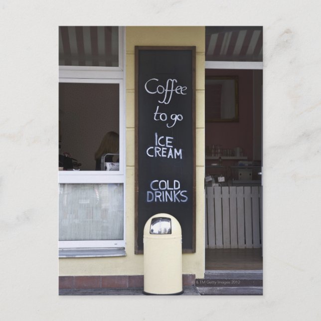 a coffee shop with a coffee to go sign postcard (Front)