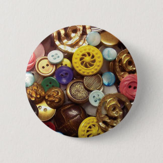 A Collage of Buttons including Yellow Wheel Button