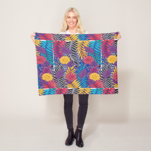 a colourful flower and leaves pattern on a blue ba fleece blanket