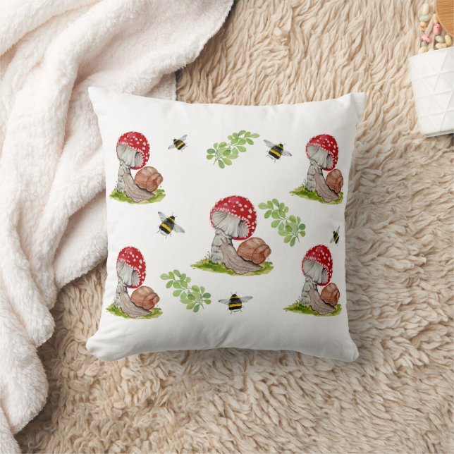 A colourful forest fly and a snail cushion (Blanket)