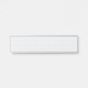 A completely white, featureless surface fills the door sign