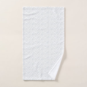 A completely white, featureless surface fills the hand towel