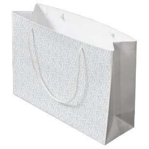 A completely white, featureless surface fills the  large gift bag