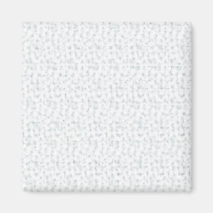 A completely white, featureless surface fills the  magnet