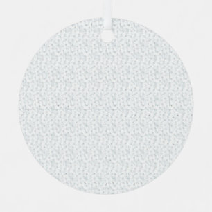 A completely white, featureless surface fills the  metal tree decoration