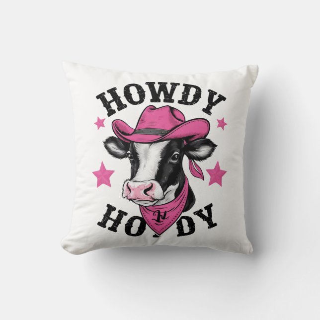 A cow wearing a vibrant pink cowboy cushion (Front)