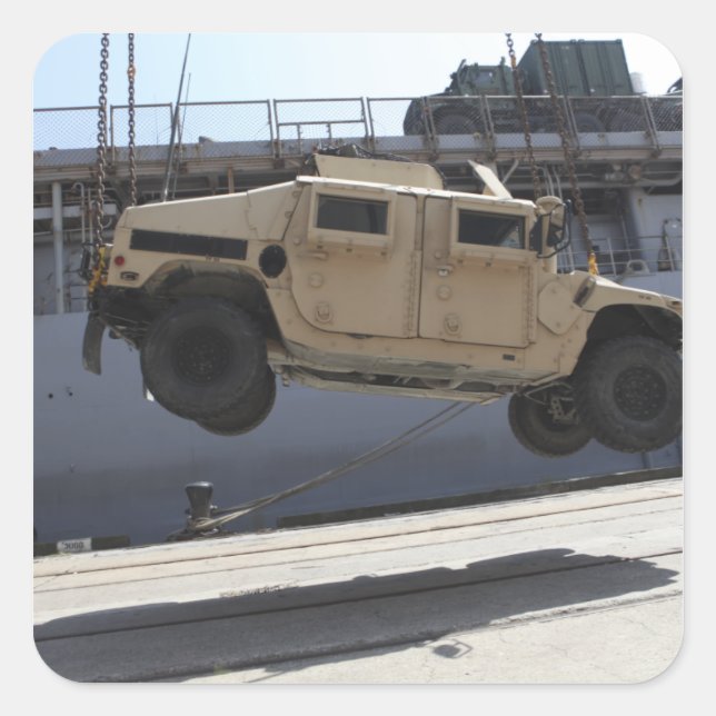 A crane lifts an M998 Humvee Square Sticker (Front)