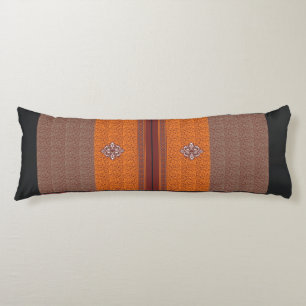 a cross stitch pattern in orange and brown body cushion