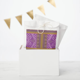 a cross stitch pattern with a purple and yellow b favour bags
