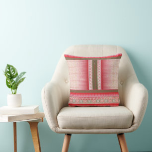 a cross stitch pattern with a red background cushion