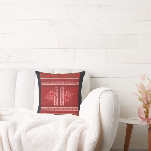 a cross stitch pattern with red flowers and vines cushion (Couch)