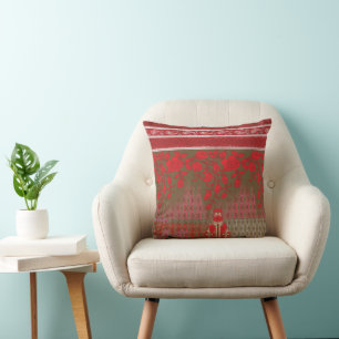 a cross stitch pattern with red flowers and vines cushion