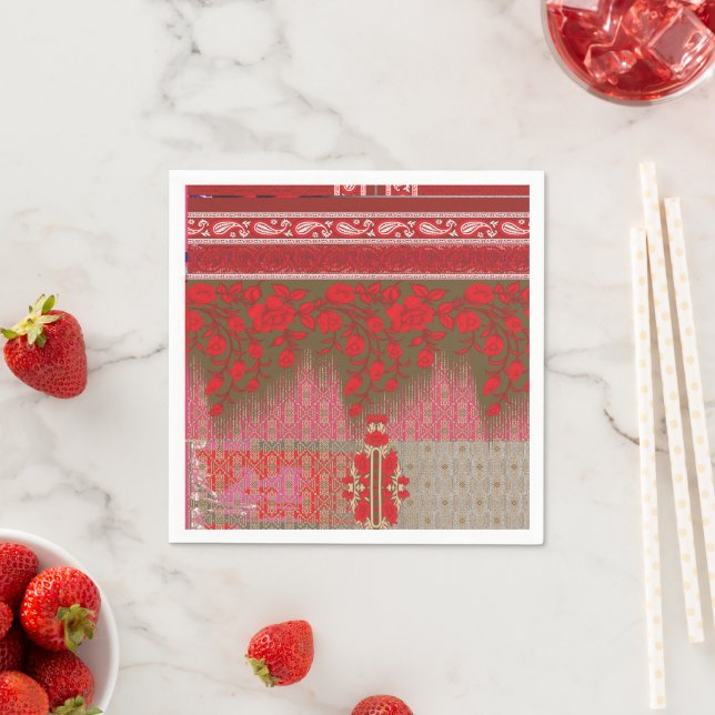 a cross stitch pattern with red flowers and vines napkin (Insitu)