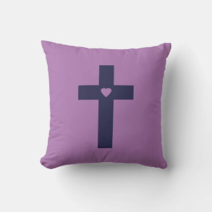A cross with heart cushion