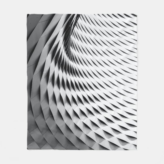 A curved facade covered in white latticework fleece blanket (Front)