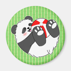 A Cute Baby Panda Playing with a Ball Magnet