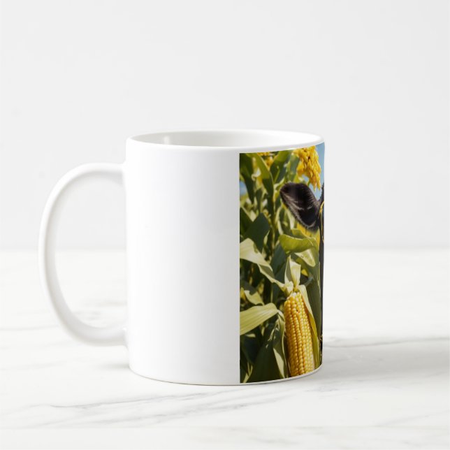 A Cute Cow in a Corn Field Eating Coffee Mug (Left)