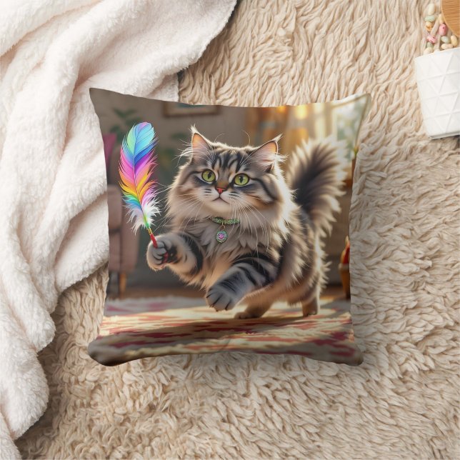 A Cute Fluffy Cat Chasing a Feather Cushion (Blanket)