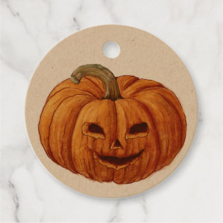 A cute puppy in a pumpkin hat sits next to a large favour tags