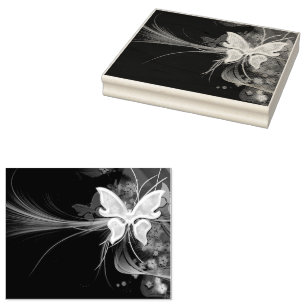 a dark background with gold triangles and blurry rubber stamp