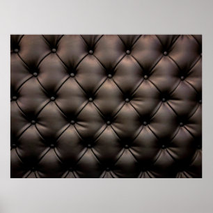 A dark leather cushion background, from a car seat poster