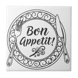 A decorative bon appetit sign with fork and knife  tile