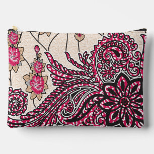 A decorative paisley design with vivid red and pin accessory pouch