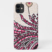 A decorative paisley design with vivid red and pin