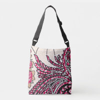 A decorative paisley design with vivid red and pin