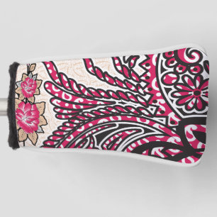 A decorative paisley design with vivid red and pin golf head cover