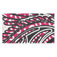 A decorative paisley design with vivid red and pin