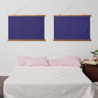 A deep blue backdrop accented by a white border, o