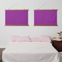A deep purple background accented by a bright whit