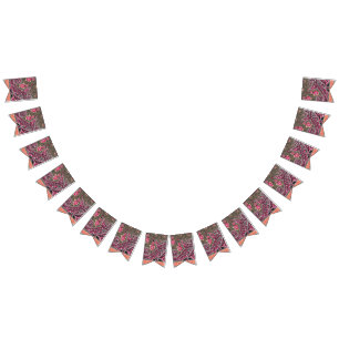 a design of a pink and brown paisley pattern bunting 