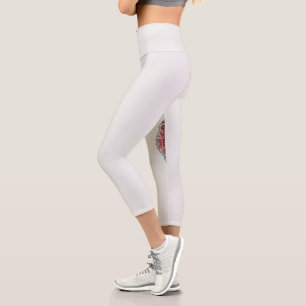 a design of a red and white pattern capri leggings