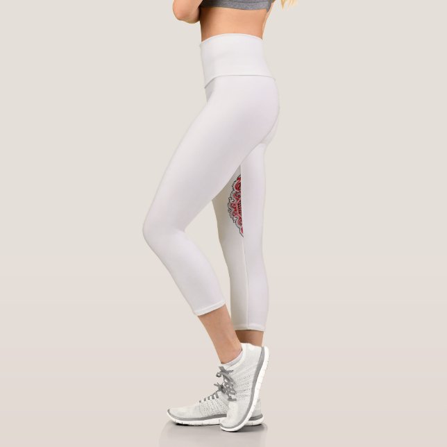 a design of a red and white pattern capri leggings (Left)