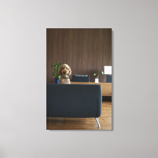 A dog in the riving room canvas print