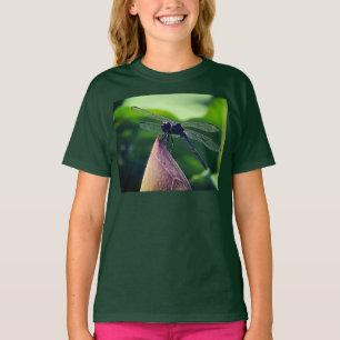 A dragonfly perches delicately  T-Shirt