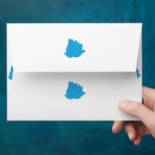 a drawing of a blue flower on a white background envelope